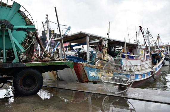 Fig. 4 - Our team collaborating with Fishing Vessel 